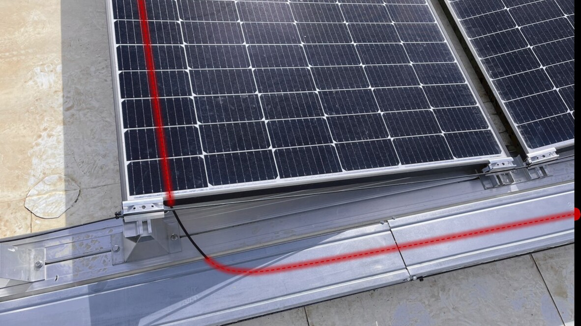 Cable installation on a solar panel
