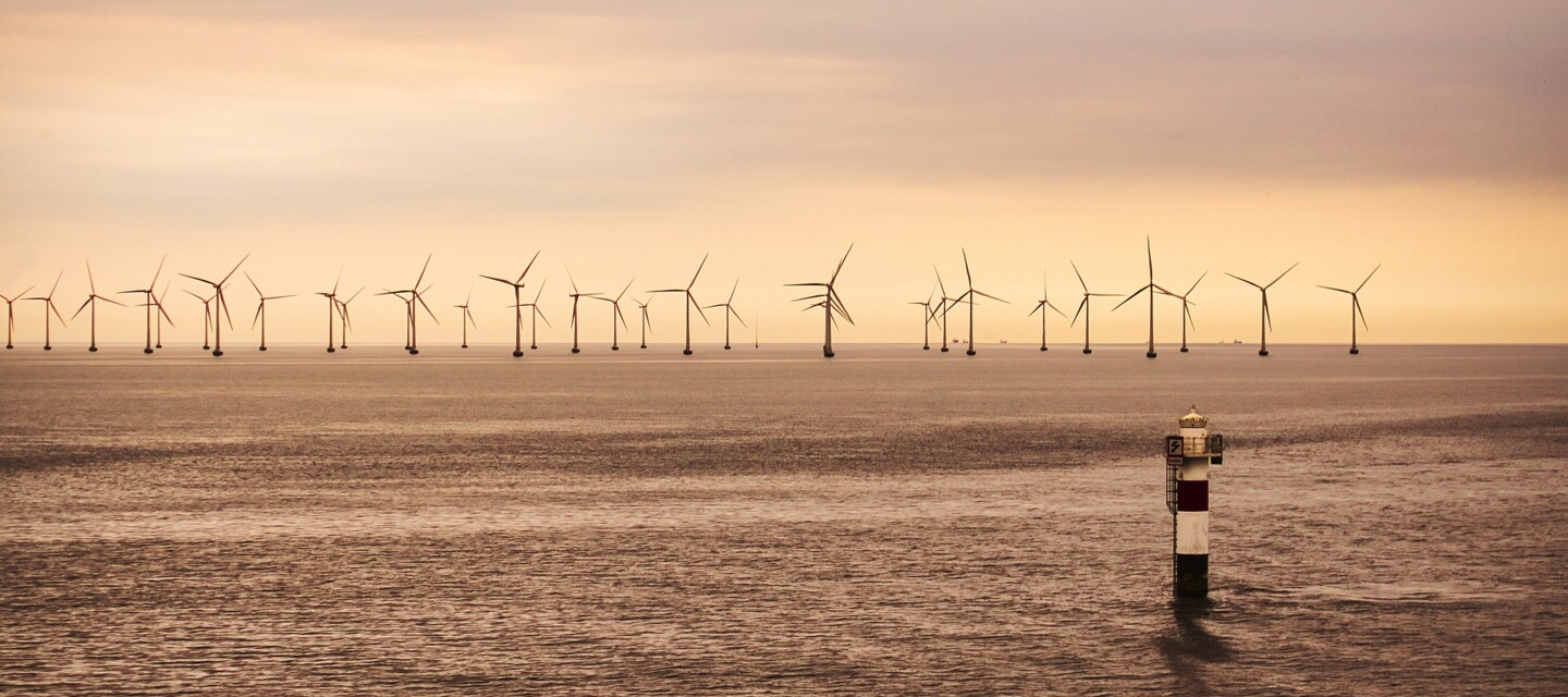 Offshore wind farm infrastructure in the sea, requiring reliable fiber optic sensing solutions for asset monitoring Offshore wind farm infrastructure in the sea, requiring reliable fiber optic sensing solutions for asset monitoring