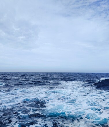 View of dynamic ocean waves, illustrating challenging conditions for offshore infrastructure monitoring View of dynamic ocean waves, illustrating challenging conditions for offshore infrastructure monitoring