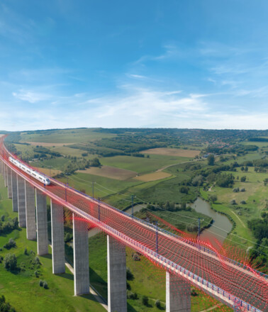 High-speed train on a viaduct, illustrating AP Sensing's fiber optic railway monitoring High-speed train on a viaduct, illustrating AP Sensing's fiber optic railway monitoring