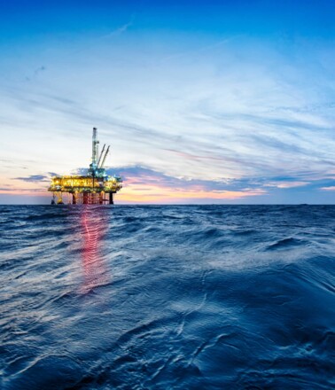 Offshore oil rig at sea, representing AP Sensing fiber optic monitoring for integrity and security Offshore oil rig at sea, representing AP Sensing fiber optic monitoring for integrity and security