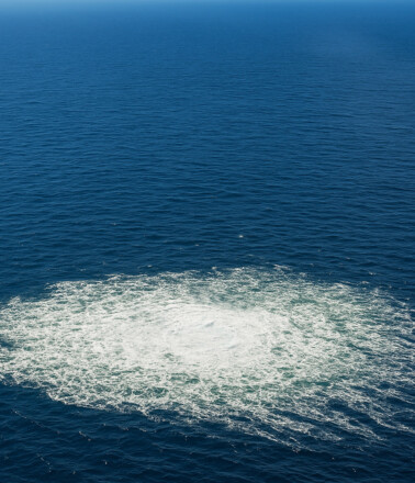 Subsea gas leak visible from the air, underscoring the need for reliable fiber optic leak detection