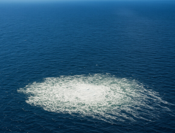 Subsea gas leak visible from the air, underscoring the need for reliable fiber optic leak detection Subsea gas leak visible from the air, underscoring the need for reliable fiber optic leak detection