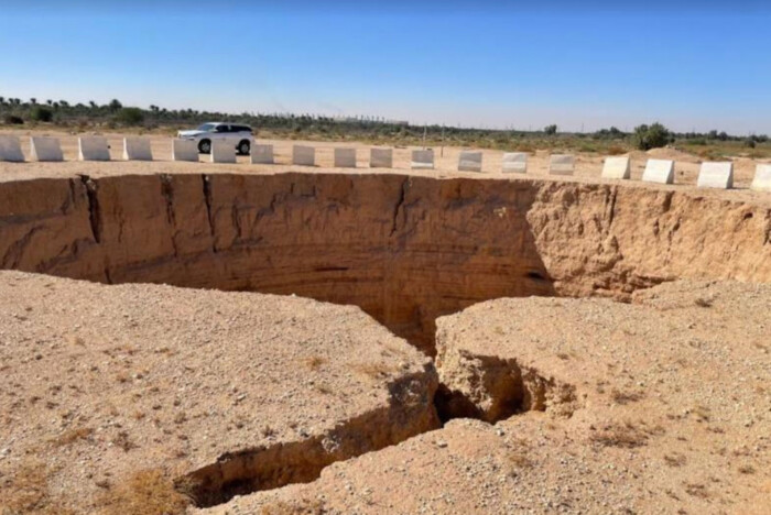 Figure 3: Sinkhole formation along road in Saudi Arabia Figure 3: Sinkhole formation along road in Saudi Arabia