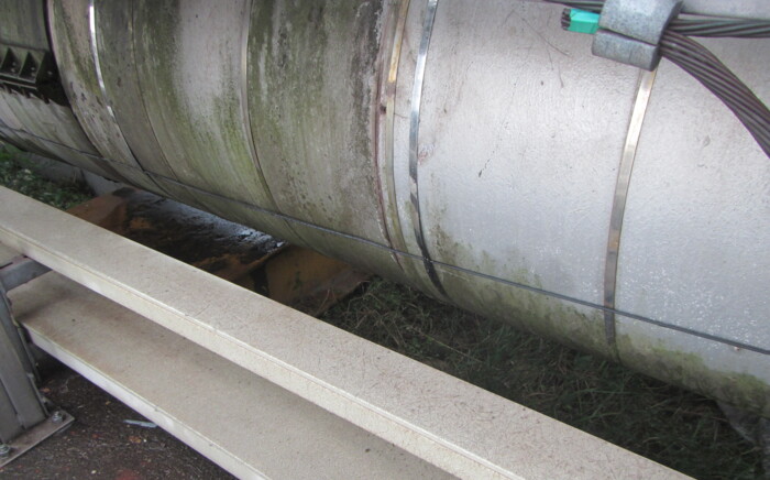 Fiber optic cable installed along terminal pipe AP Sensing fiber optic technology for monitoring the condition of pipelines and power cables