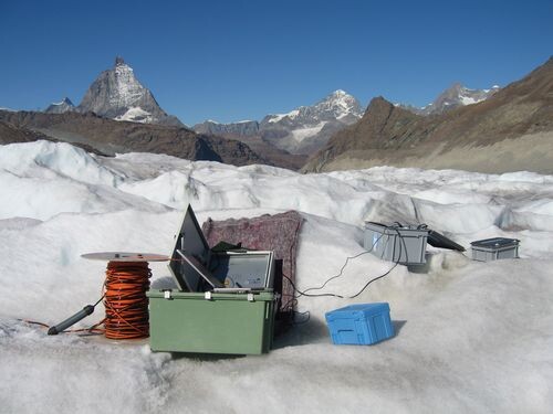 AP Sensing environmental monitoring setup using fiber optic sensing technology on a glacier AP Sensing environmental monitoring setup using fiber optic sensing technology on a glacier